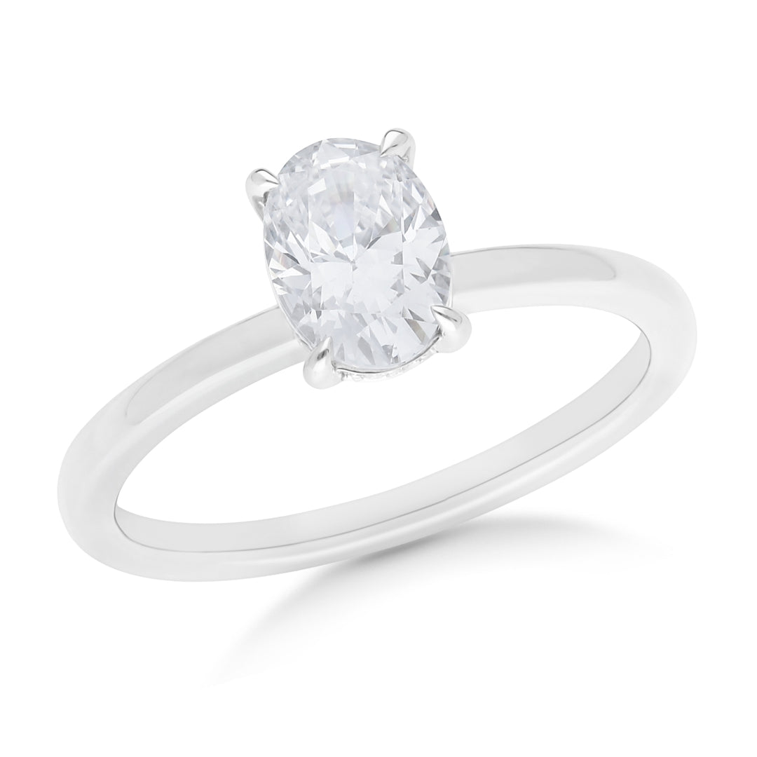 Claw Set Oval Cut Solitaire Engagement Ring With Hidden Halo